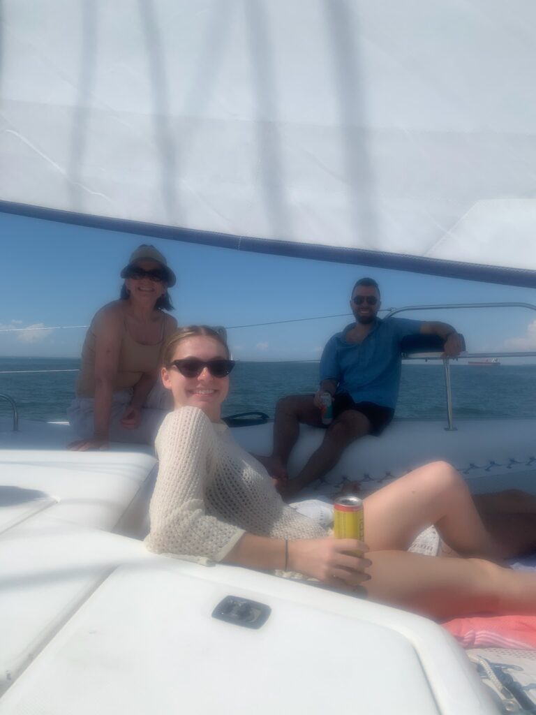 A group of people sitting on top of a boat.